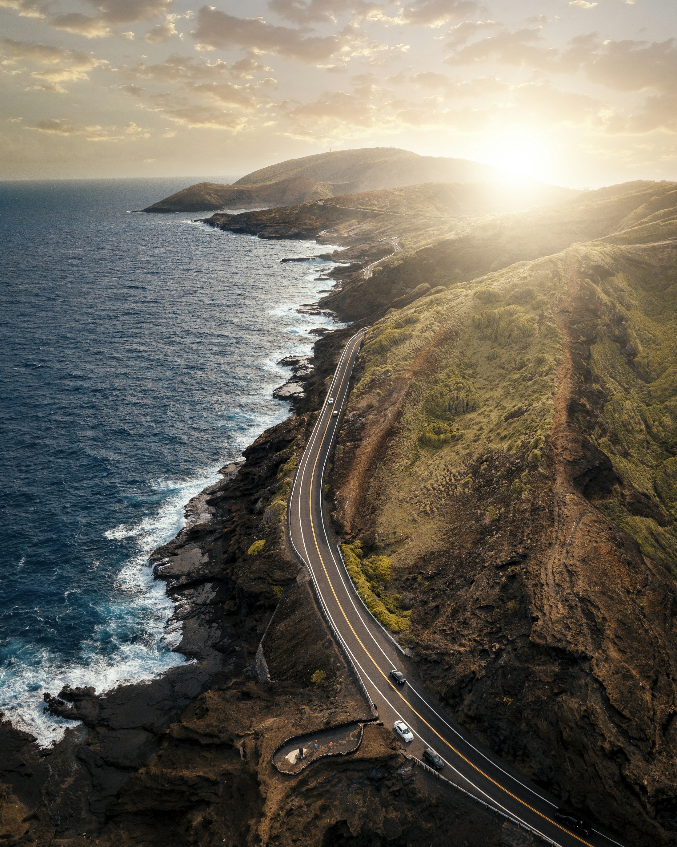 Coastal road curving beside the ocean