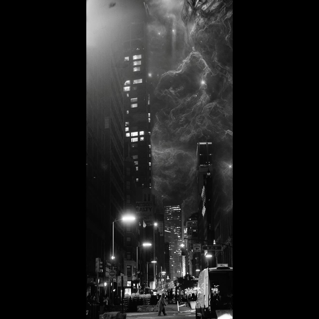 Black-and-white New York street photograph with illuminated buildings and a spectral figure in the sky
